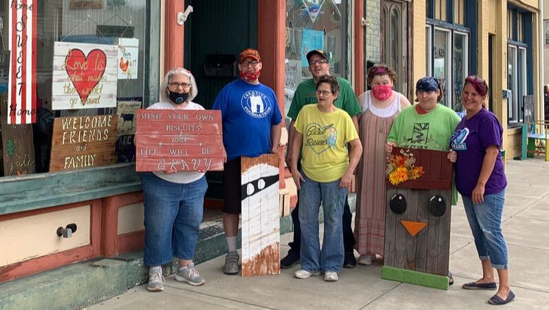 Creative Foundations clients and staff outside their storefront in Urbana, Ohio